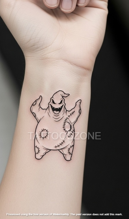 Minimalist oogie tattoo on wrist