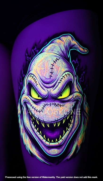Neon glow oogie tattoo on thigh